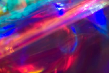 Bulanık holografik arka plan. Soyut holografik folyo arka planı. Gökkuşağı arka planı. Geleceğin ışıkları.