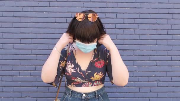 Young Caucasian Woman Putting Her Face Mask Smiling Camera Coronavirus — Stock Video