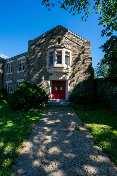 Cobblestone Church Path Leading Red Door Clear Blue Sky Stock Photo