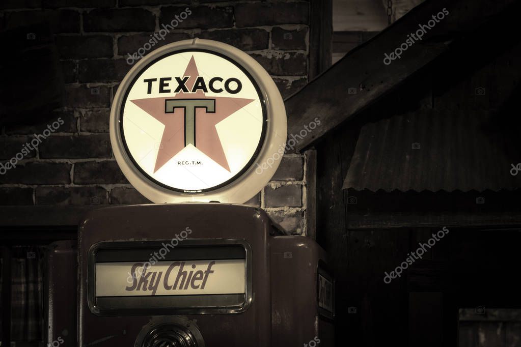 Frankenmuth, Michigan, USA - October 9, 2018: Retro Texaco gas pump with illuminated gas globe.