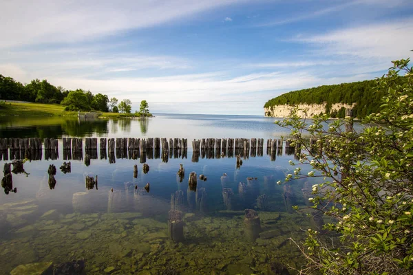 Michigan State Parks. Beautiful view of old harbor and the limestone cliffs along the coast of Lake Michigan in Fayette State Historical Park in the Upper Peninsula of Michigan.