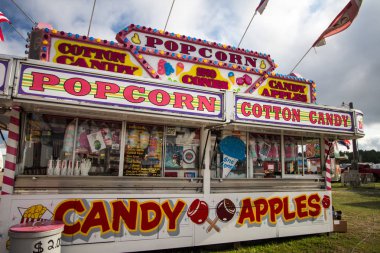 Cheboygan, Michigan, USA - August 9, 2018: Food concession booth at the Cheboygan County Fair in northern Michigan. clipart