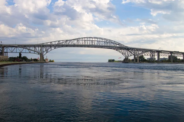 The twin spans of the Blue Water Bridge are the link between Port Huron, Michigan and Sarnia, Ontario. It is one of the busiest border crossings between the United States and Canada.