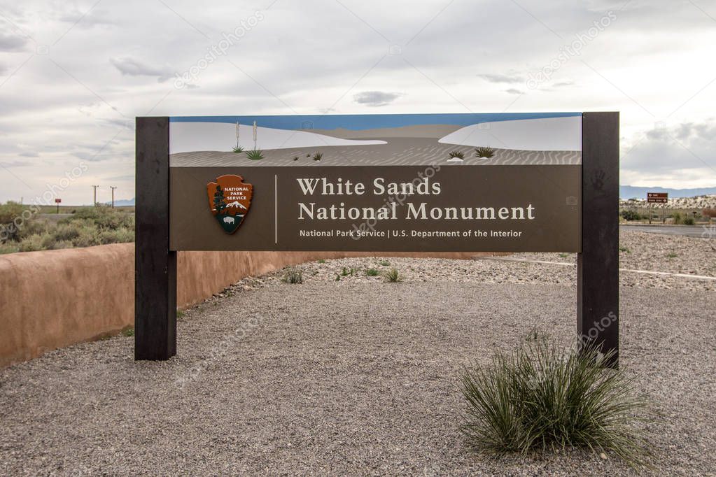 Alamogordo, New Mexico, USA - April 28, 2019: Entrance to the White Sands National Monument in New Mexico. The park is renowned for its massive white gypsum sand dunes and surreal other worldly landscapes.