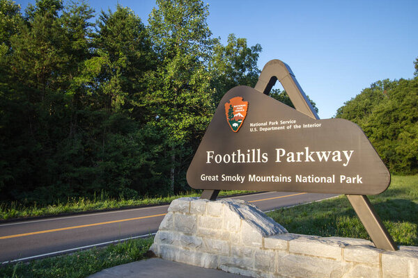 Wears Valley, Tennessee, USA - August 12, 2020: Sign for the newly completed section of the Foothills Parkway. The completed section is 16 miles and runs between Wears Valley and Walland Tennessee and was completed in 2018.