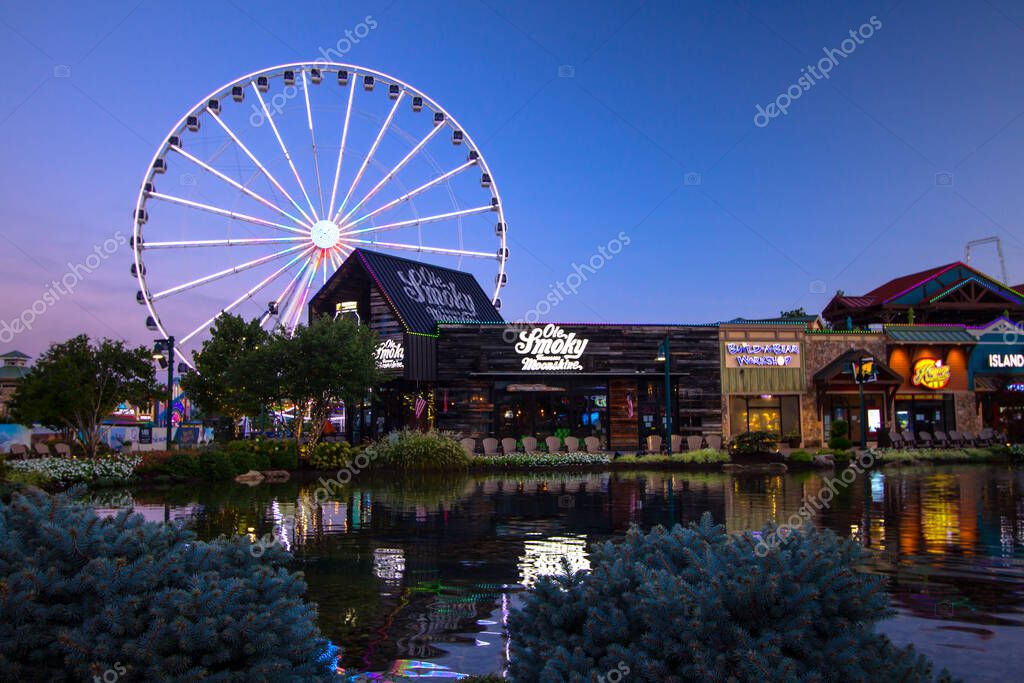 Pigeon Forge, Tennessee, USA - August 16, 2020: Exterior of the Ole Smoky Mountain Moonshine Distillery in Tennessee. The distillery features Tennessee's only legally brewed moonshine and is one of Tennessee's fastest growing companies.