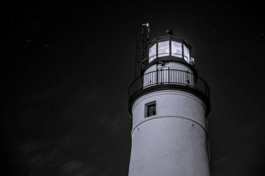 Kopyalama alanı olan siyah ve beyaz deniz feneri. Fort Gratiot Deniz Feneri Büyük Göller 'deki en eski deniz fenerlerinden biridir ve Port Huron, Michigan' dadır.. 