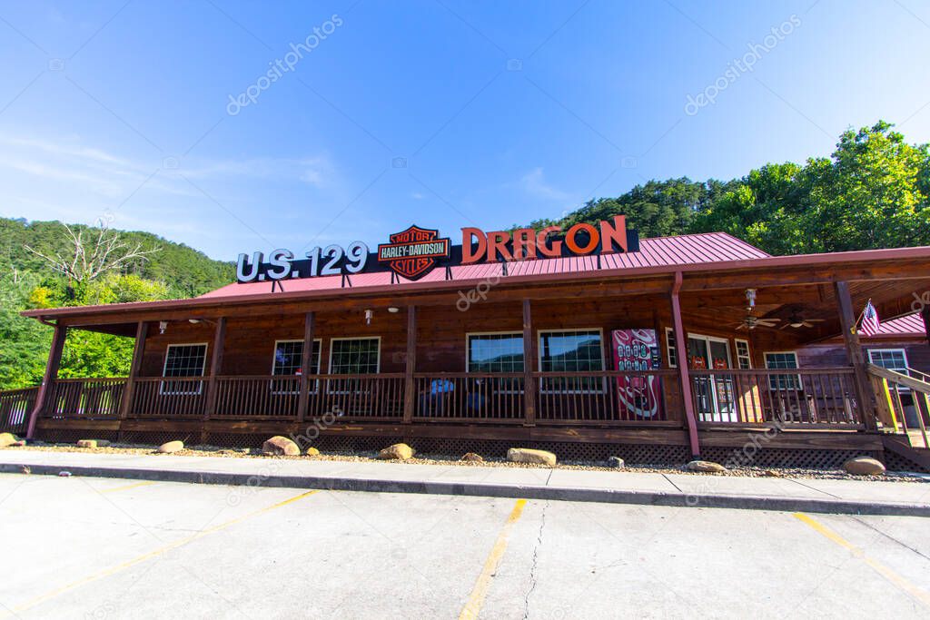 Maryville, Tennessee, USA - August 12, 2020: Sign for the Smoky Mountain Harley Davidson located on the Tail of the Dragon trail near Deals Gap in the Appalachian Mountains of Tennessee.