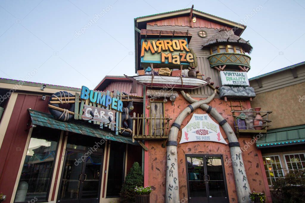 Pigeon Forge, Tennessee, USA - August 15, 2020: Entrance to the Ripleys Mirror Maze and Bumper Cars at The Island Amusement and Entertainment complex in Pigeon Forge.