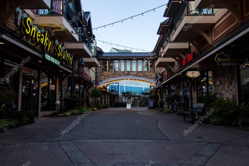 Pigeon Forge, Tennessee, USA - August 15, 2020: The Market Street shopping district at the Island Amusement and attraction complex on the strip in the popular mountain resort town of Pigeon Forge.