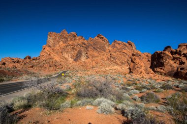 Desert Road Trip. Nevada scenic byway through the Valley Of Fire State Park. clipart