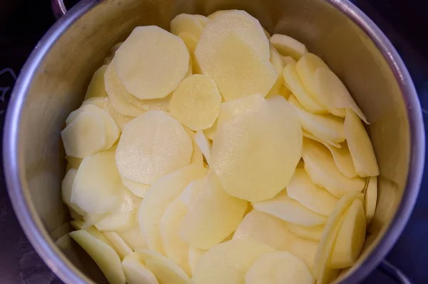 Thinly Sliced Fresh Peeled Potatoes Bowl Close Overhead View Ready — Stock Photo, Image