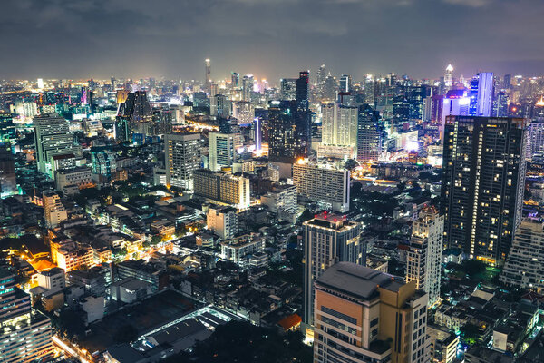 Aerial view beautiful of Bangkok city downtown skyline, cityscape at night Bangkok Thailand