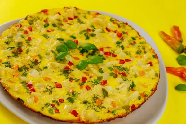Homemade scrambled eggs wi Homemade Scrambled Eggs Vegetables White Plate Yellow Background Close Royalty Free Stock Photos