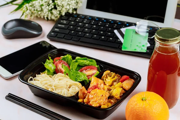 Order food from home or work concept. Take away lunch. Chinese food.