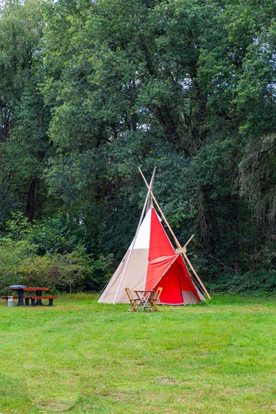 Colorful campsite with wigwam tents — Stock Photo, Image