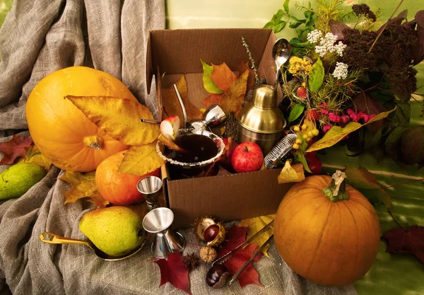 Fall Halloween Thanksgiving season special post delivery box with fruits and vegetables apples pumpkin maple leaves bar accessories including shaker martini cocktail. Bar autumn specialties promo — Stock Photo, Image