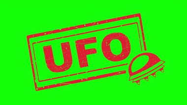 video animasyon kırmızı kauçuk mühür UFO metin ve yabancı uzay gemisi sembolü, yeşil renkli anahtar arkaplan