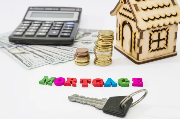 Word Mortgage Wooden House Calculator Money Keys Loan Form Pledge — Stock Photo, Image