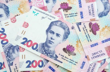 200 Hryvnia / para geçmişi olan yeni banknotlar. Ukrayna parası. İş konsepti. Hryvnia ile arkaplan.