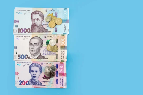 New Ukrainian Banknotes Coins Blue Background Copy Space — Stock Photo, Image