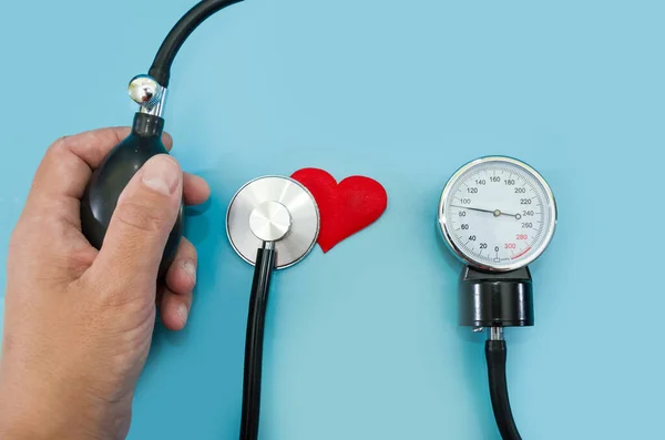 Female Hand Tonometer Stethoscope Heart Blue Background Concept Health Measurement — Stock Photo, Image