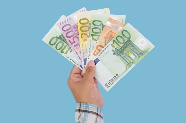 Olika Eurosedlar Kvinnlig Hand Med Blå Bakgrund Affärsidé — Stockfoto