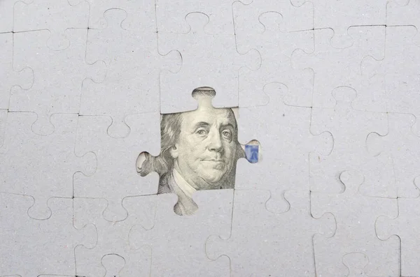 Jigsaw puzzle with Franklin looking to you.There is no one puzzle