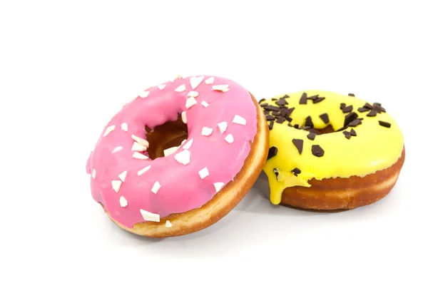 Zwei Köstliche Donuts Mit Gelbem Und Rosa Zuckerguss Isoliert Auf — Stockfoto