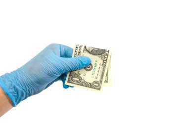 bir eldiven bir dolar tutar / beyaz arkaplan / kopyalama alanı izole.