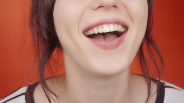 Young Happy Woman Smiles Camera Red Background Close — Stock Video