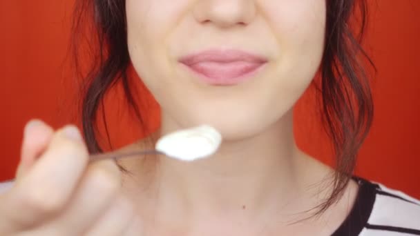 Woman Lipstick Makeup Eats Yogurt Spoon Brunette Woman Bright Red — Stock Video