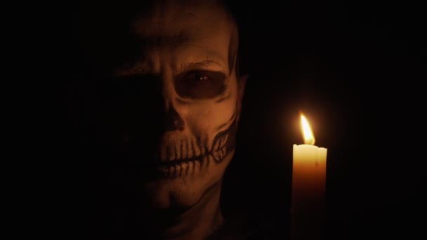 Makeup Skeleton Halloween Man Skeleton Dim Light Candle Looks Camera — Stock Video