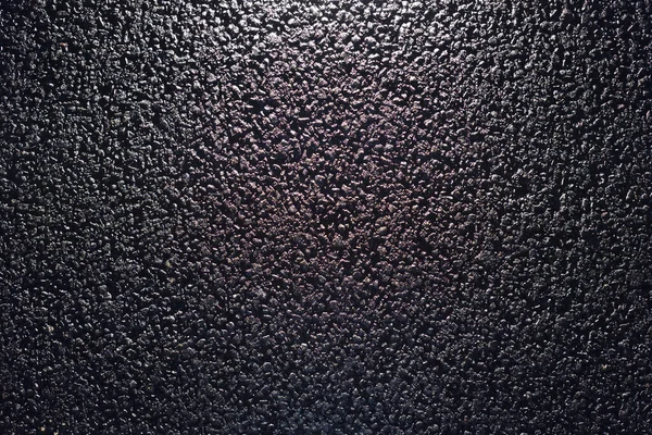 Texture of fresh and new black asphalt. Background of new asphalt.