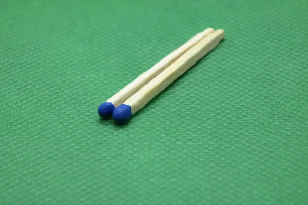 Two Matches Green Table — Stock Photo, Image