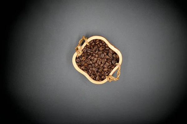 coffee beans in the shape of heart.coffee beans background.coffee beans background.coffee beans in a sack.roasted coffee beans.coffee beans in a bag