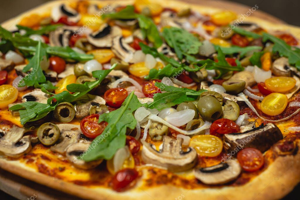 Big vegetarian pizza close up