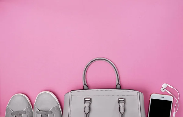 Women Handbag Gray Sneakers Smartphone Headphones Pink Background View Copy — Stock Photo, Image
