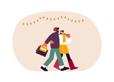 Mutlu çift Noel alışverişinden sonra birlikte yürüyor.