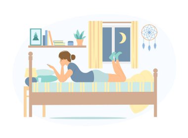 Gece yatakta akıllı telefon kullanan bir kadın.
