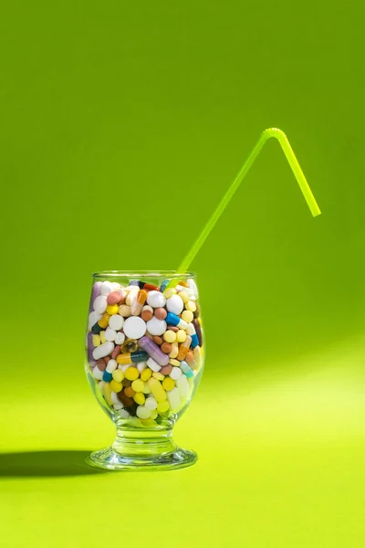 Glass Full Colorful Pills Green Straw Creative Composition — Stock Photo, Image