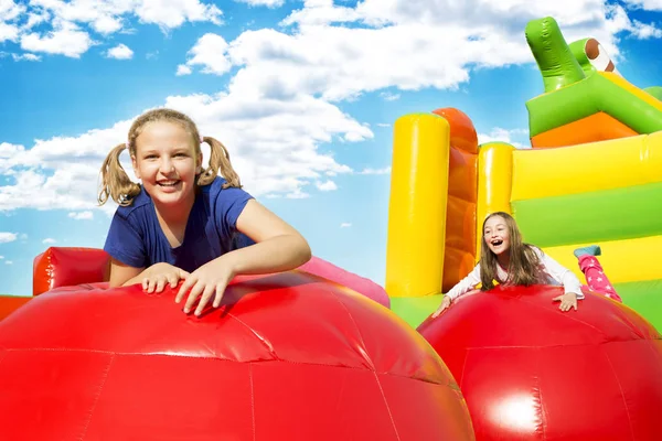 Happy Girls on Jupming Castle — Stock Photo, Image