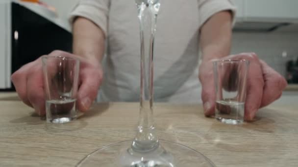 Making Alcoholic Cocktail Bartender Stands Counter Home Pushes Glasses Camera — Stock Video