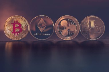 Cryptocurrency coins - Bitcoin, Ethereum, Ripple and Litecoin. BTC, ETH, XRP, LTC clipart