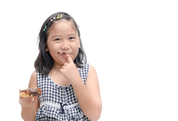 Маленькая Счастливая Милая Девочка Ест Пончики Изолированы Белом Фоне Ребенок — стоковое фото