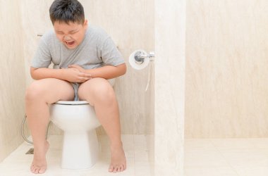 Şişko mide acı ve oturup tuvalet, ishal kabızlık ve sağlık kavramı