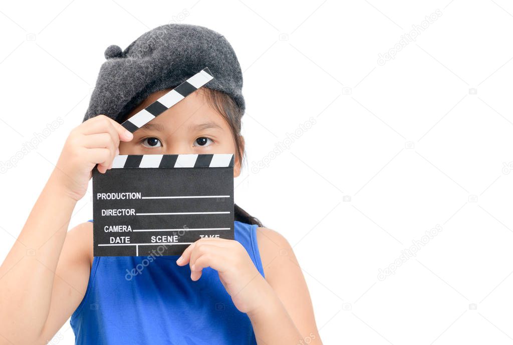 Little Director holding clapper board or slate film for making video cinema isolated on white background and copy space. Movie and cinema concept