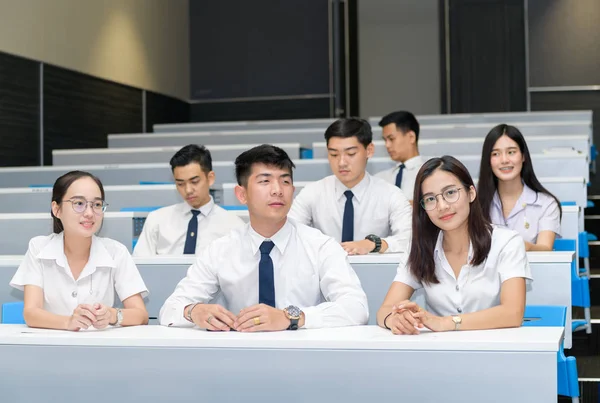 Group of students learning in classroom — Stock Photo, Image