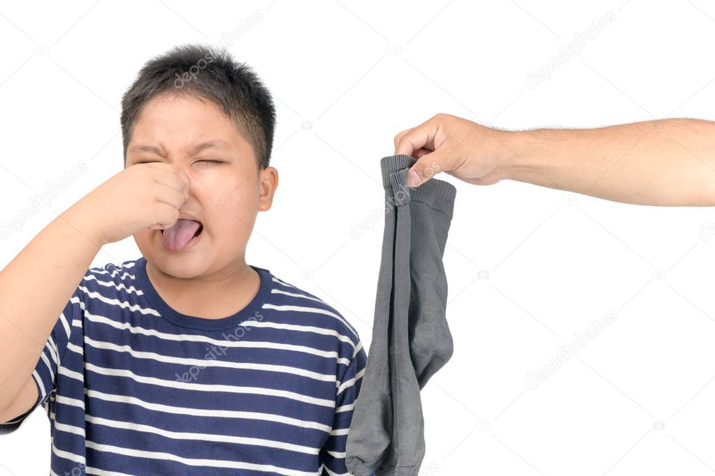 hand man holding dirty stinky socks isolated 