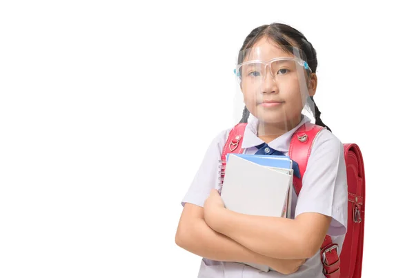 Estudante Bonito Usando Protetor Facial Segurando Livro Carrega Saco Escolar — Fotografia de Stock